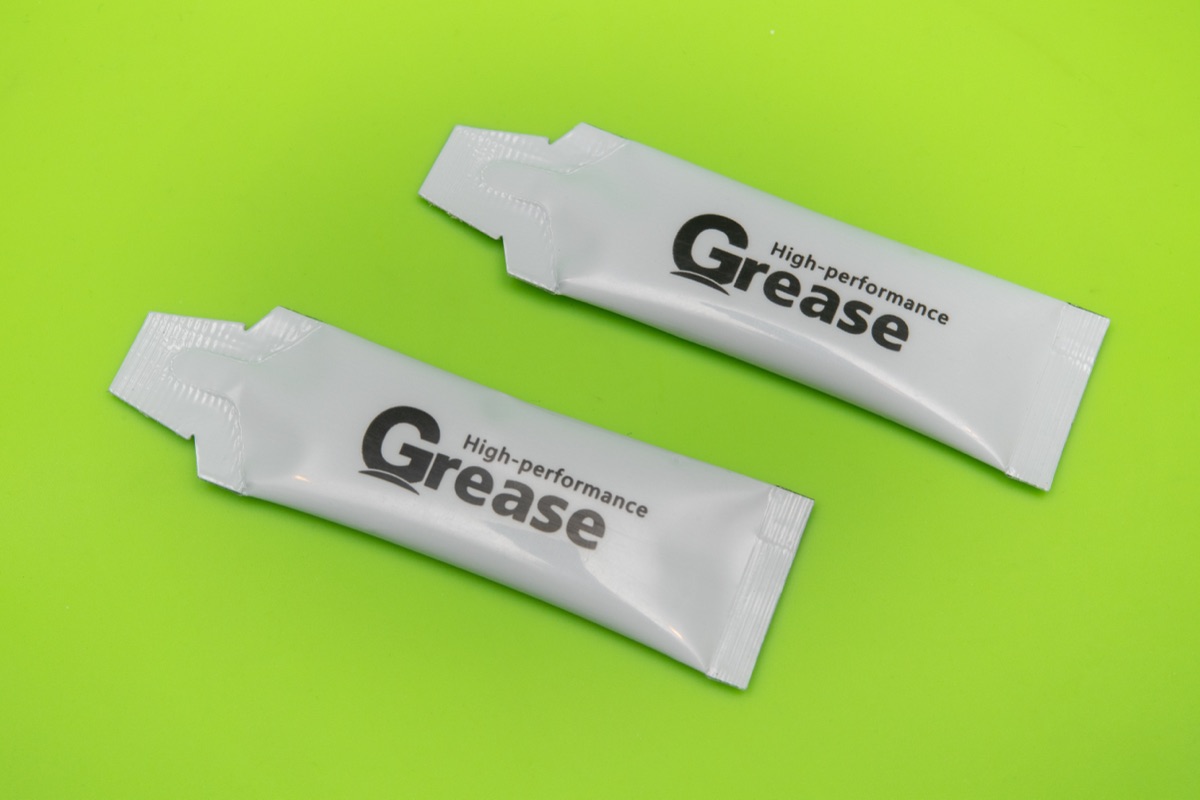 Tapping the plank into place with the non-scratch rubber mallet